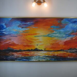 Tableau moderne fait main Ghoroub : coucher de soleil panoramique aux tons orange, or et cobalt, cadre doré